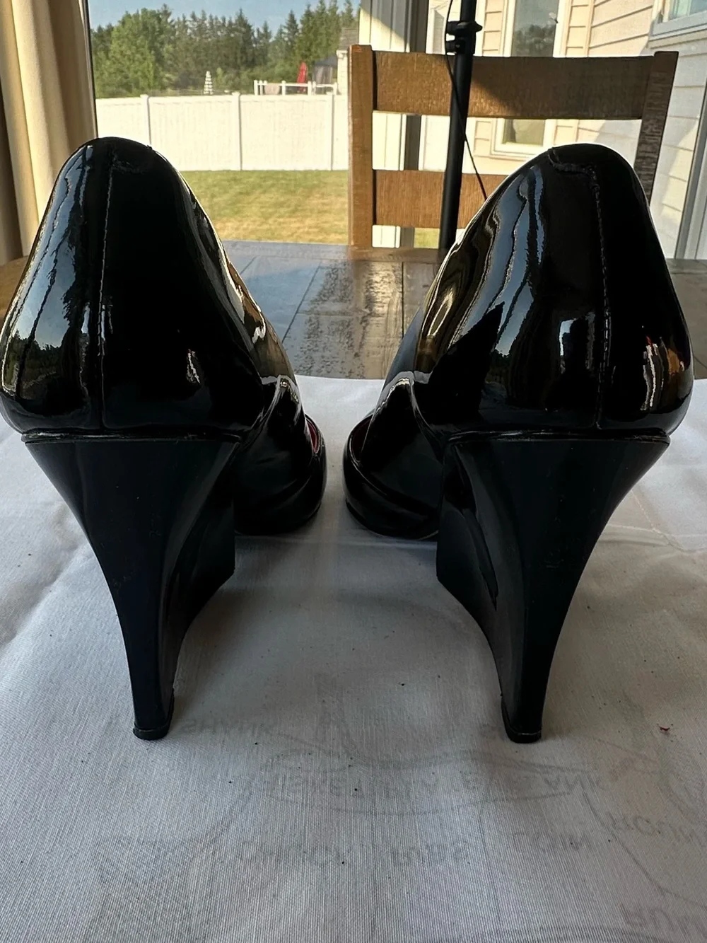 Charles Jourdan Paris black wedge heels with red interior